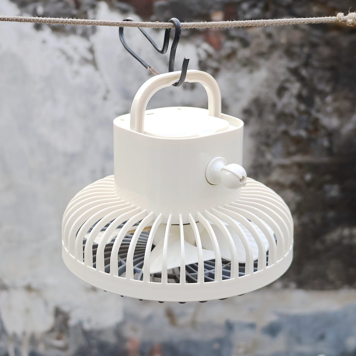 JYSUPER JY-2218 fan back side showing AC/DC operation option and mobile phone stand
