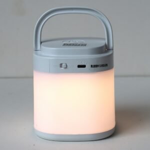 "Rechargeable LED Night Light with Clock and Remote, displaying warm light"